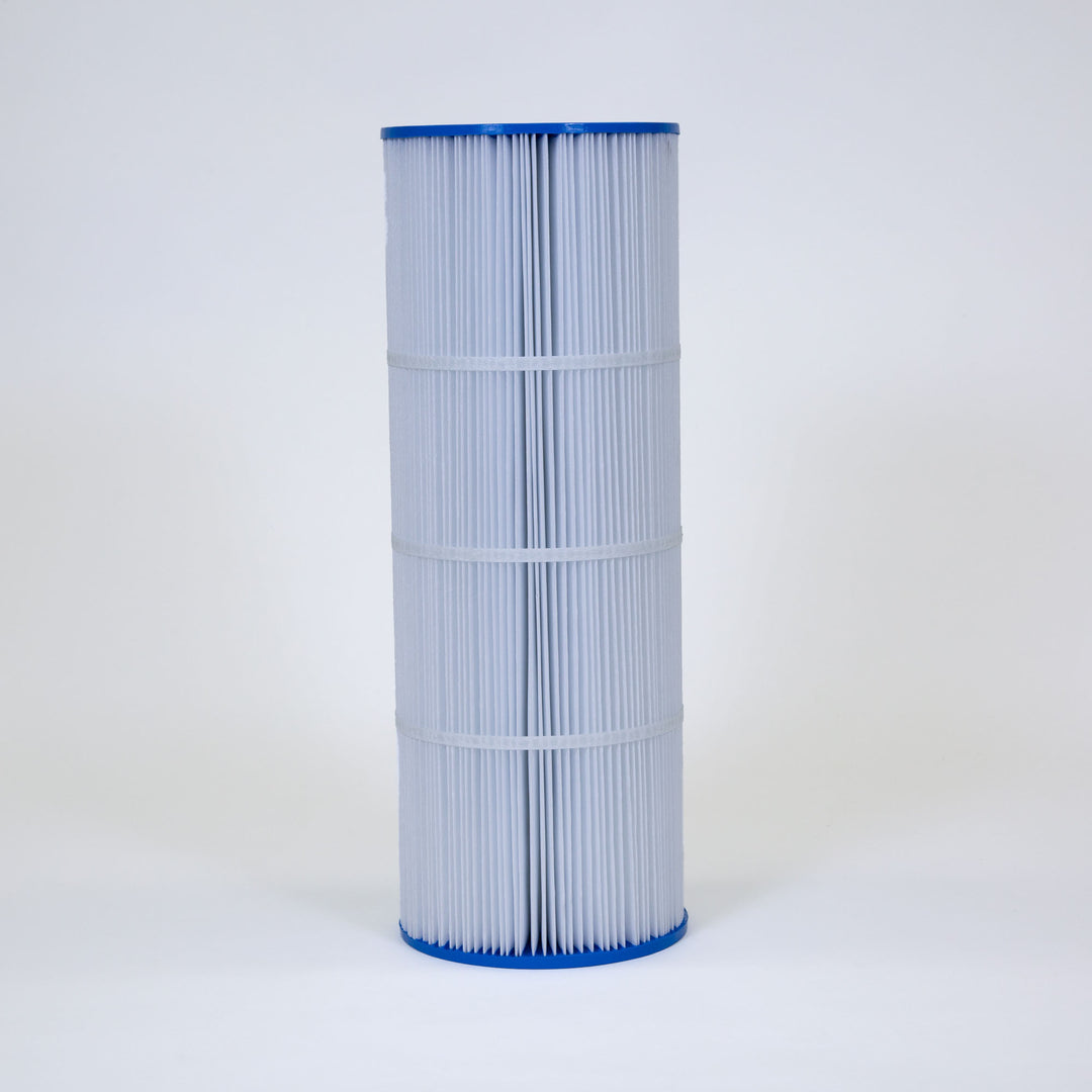 Cylindrical pool filter cartridge with white pleated material and blue plastic end caps on neutral background