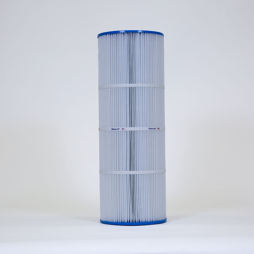 Tall cylindrical pool filter cartridge with white pleated material and blue edges on a plain background
