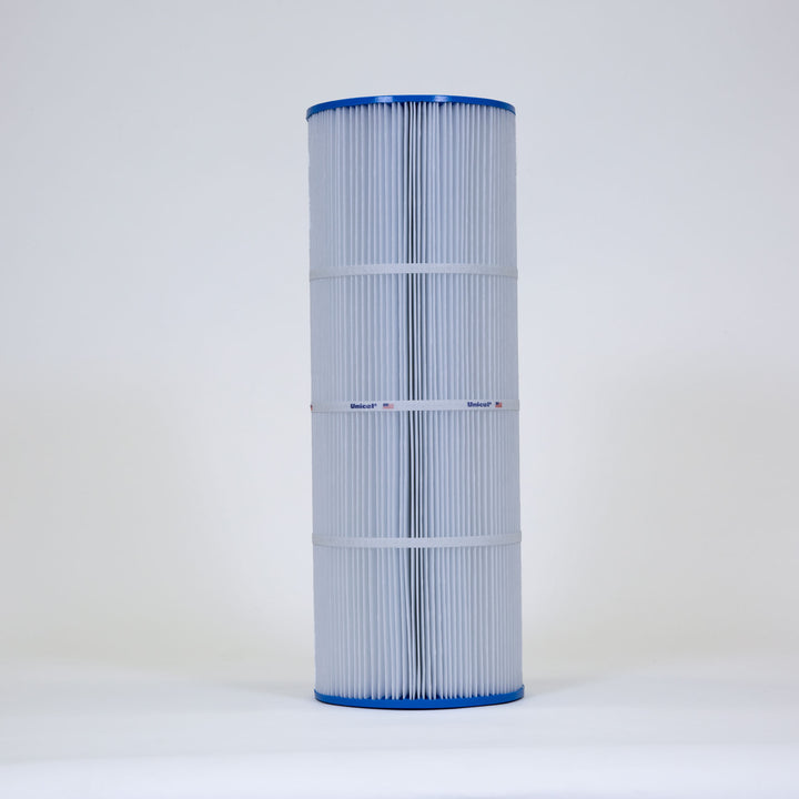 Tall cylindrical pool filter cartridge with white pleated material and blue edges on a plain background