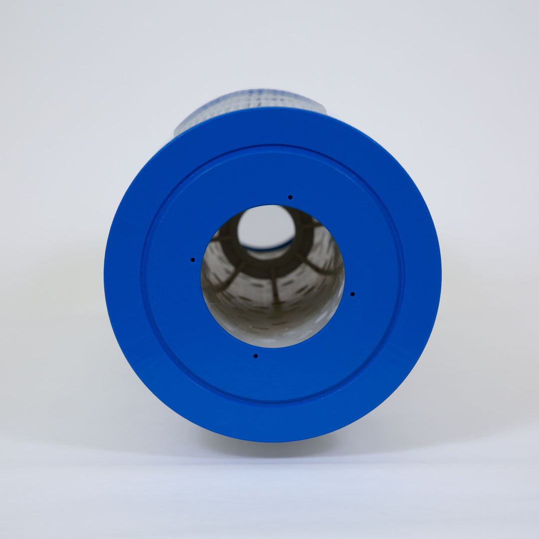 close-up view of the blue end of a cylindrical pool filter cartridge showing the hollow center and interior structure