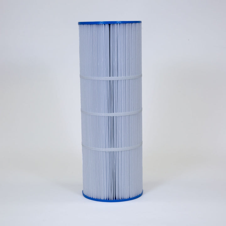 cylindrical pleated white filter cartridge with blue end caps standing upright on white background