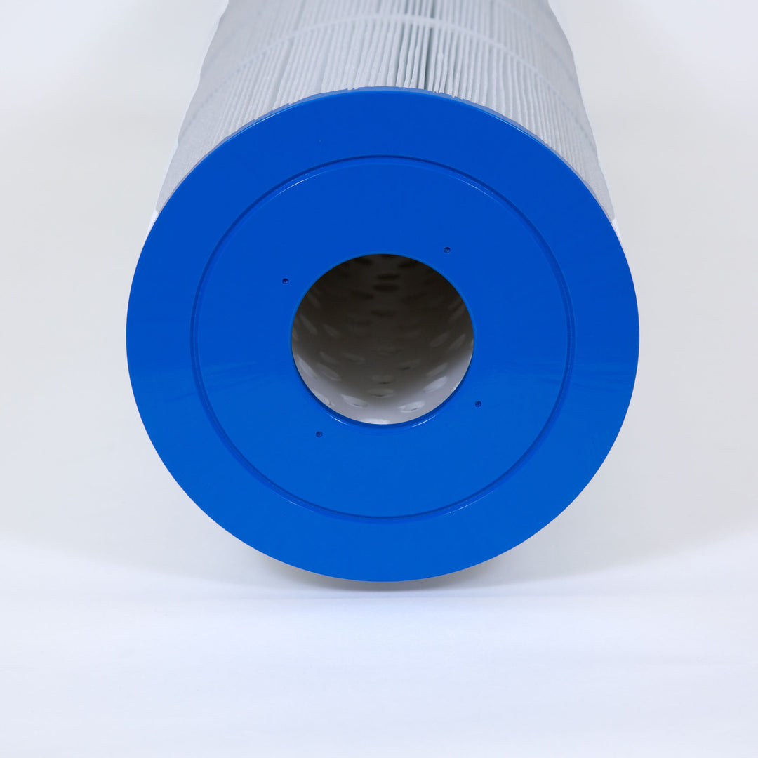 cylindrical pool filter cartridge with white pleated material and blue end cap on white background