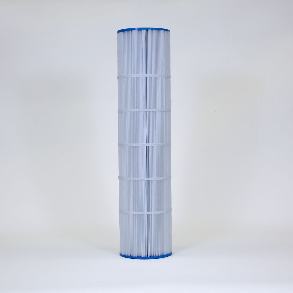 Tall cylindrical pool filter cartridge with white pleated fabric and blue plastic ends standing upright on a plain white background