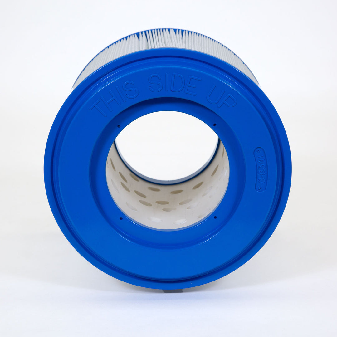 Cylindrical micro filter cartridge with pleated white filtering material and blue plastic end cap marked with C-8341