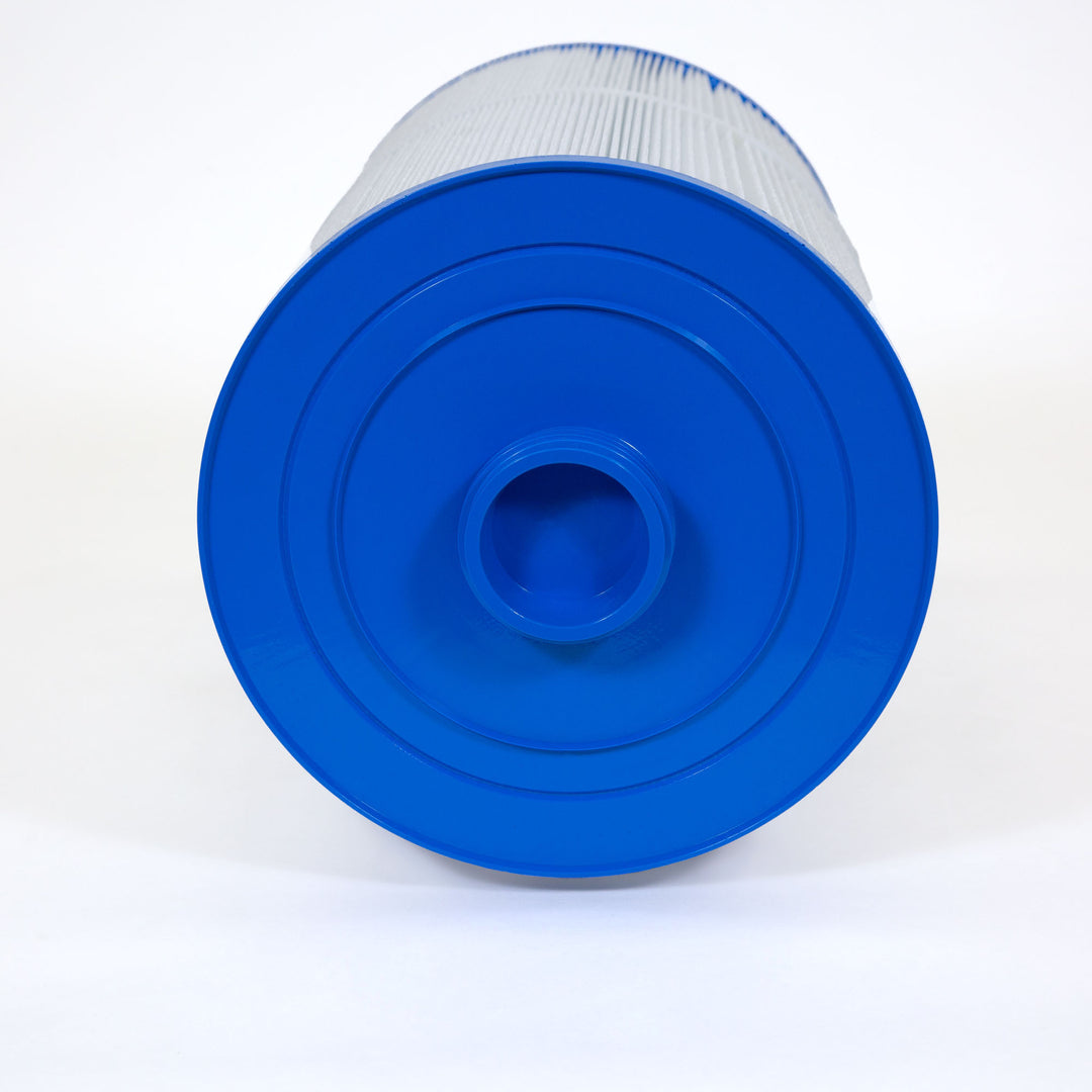 cylindrical water filter cartridge with white pleated body and solid blue plastic end cap viewed from the end
