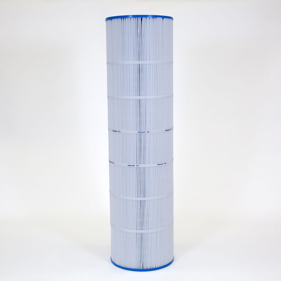 Tall cylindrical pool filter cartridge with white pleated material and blue end caps standing upright on a white background