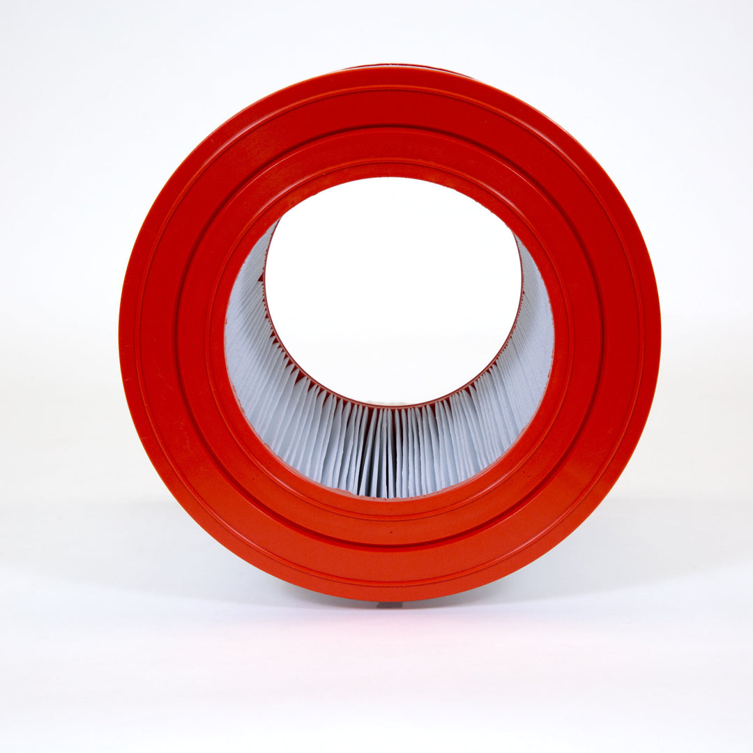 cylindrical pool filter cartridge with bright red outer rims and pleated white filter paper inside