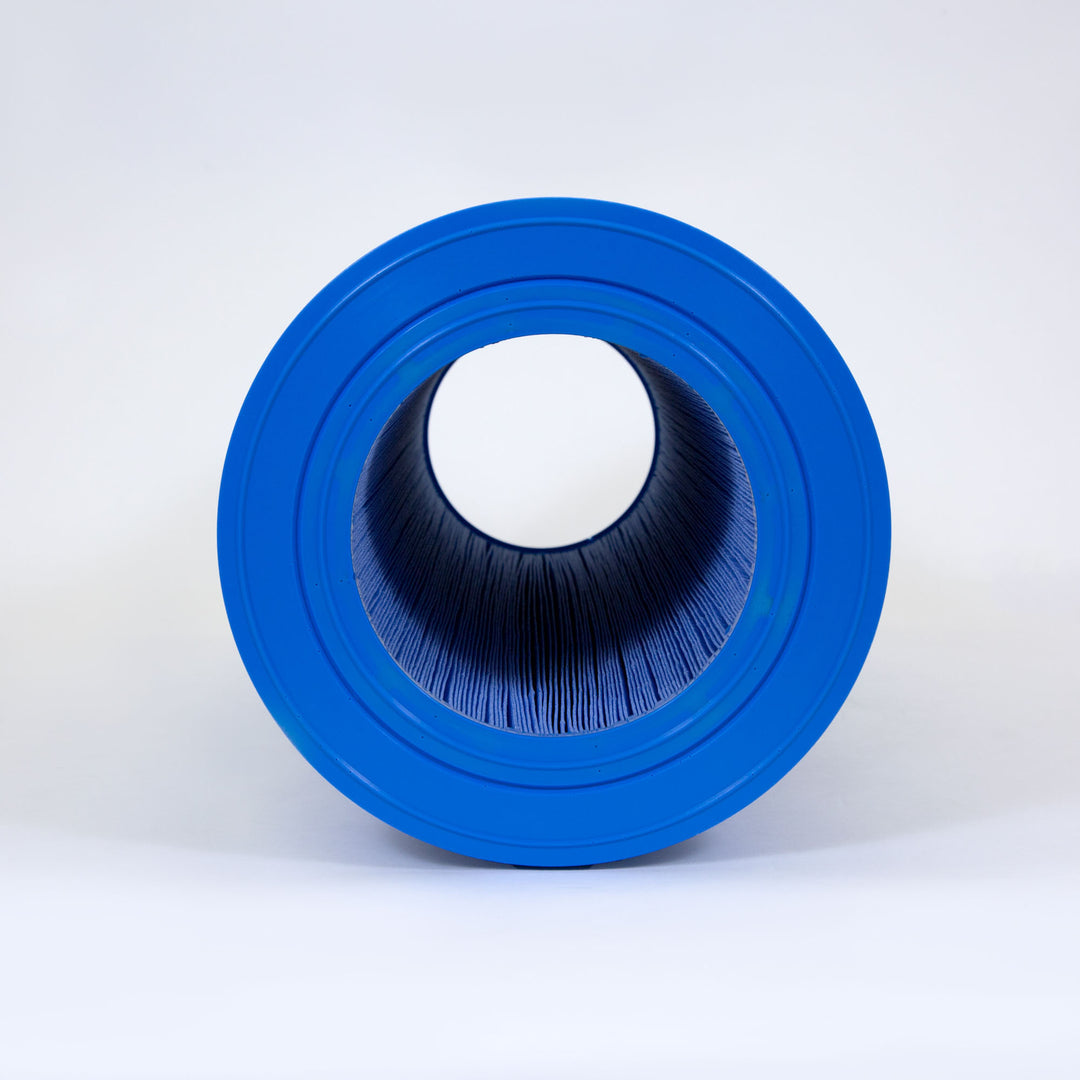 cylindrical pool filter cartridge with blue end caps and pleated filtration material inside against a white background