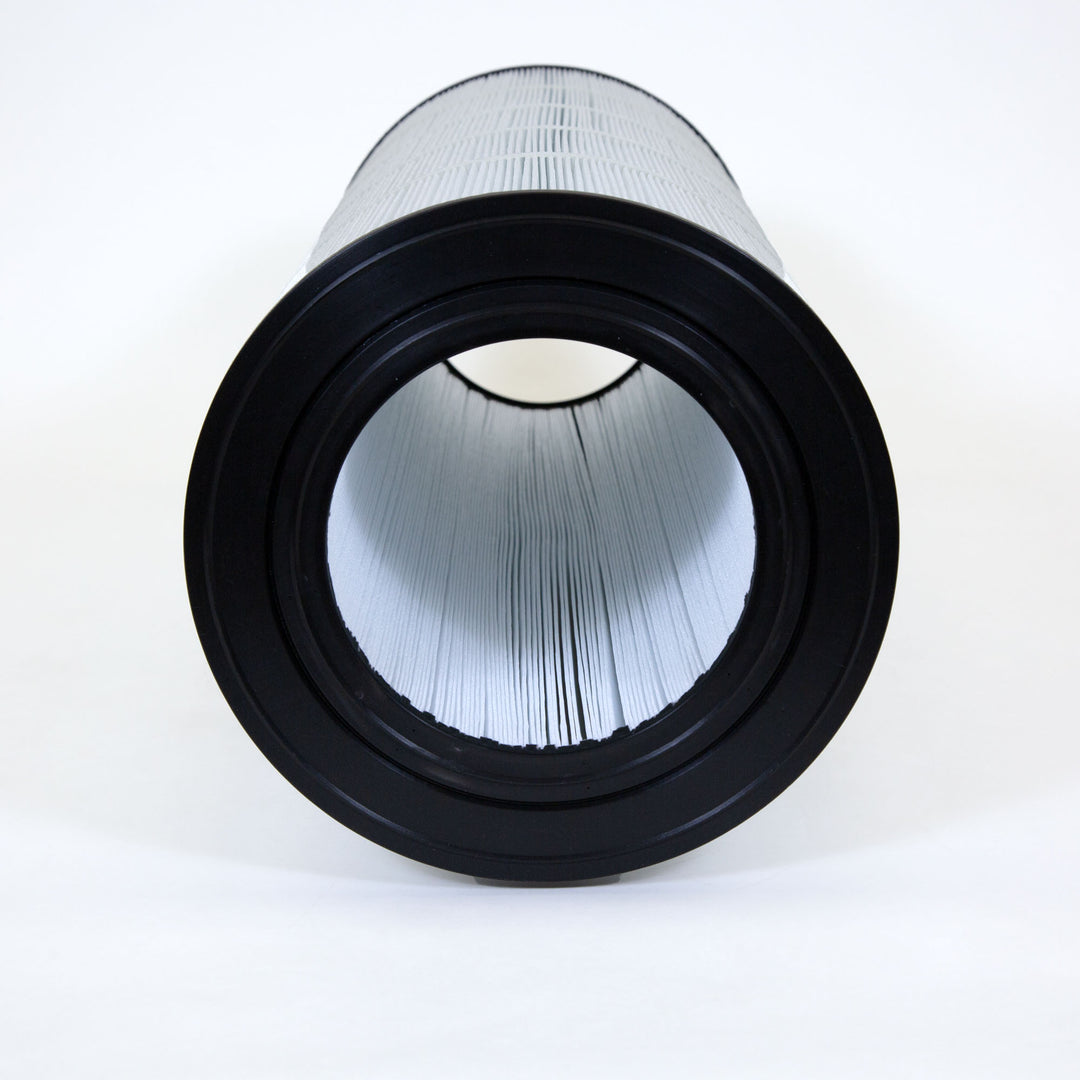 Cylindrical pool filter cartridge with white pleated material and black plastic end cap viewed straight through the hollow center