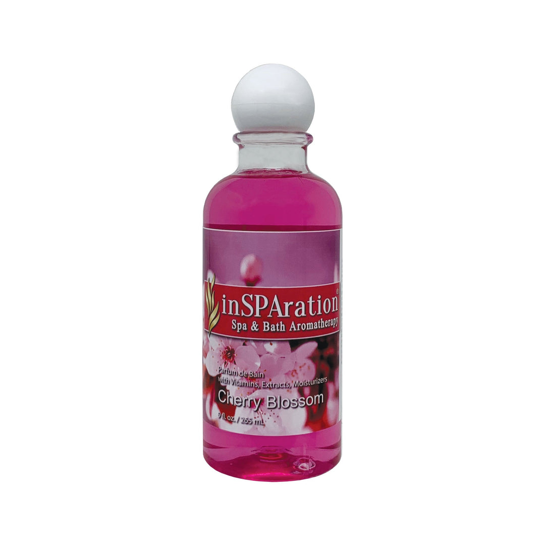 InSPAration 9oz oil-free aromatherapy liquid bottle with bright pink liquid and white rounded cap featuring cherry blossom label