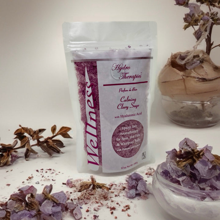 wellness 12oz epsom salt aromatherapy bag with purple salt crystals and calming clary sage label design in clear resealable pouch