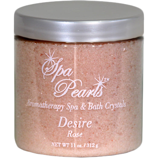 Insparation Inc Spa Pearls Aromatherapy Spa and Bath Crystals Desire Rose in a clear round jar with silver lid showing pink crystal granules