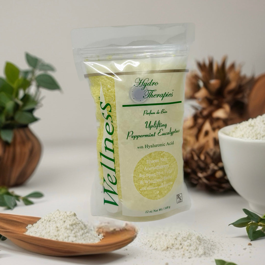 Wellness 12oz Epsom Salt Aromatherapy pouch by Insparation Inc with yellow salt crystals and clear resealable packaging with green text