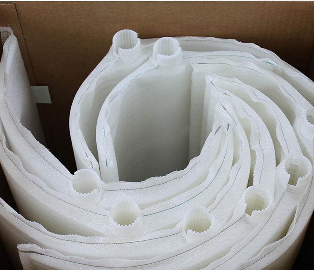 white pool filter grids rolled inside a cardboard box with cylindrical connectors on top edges