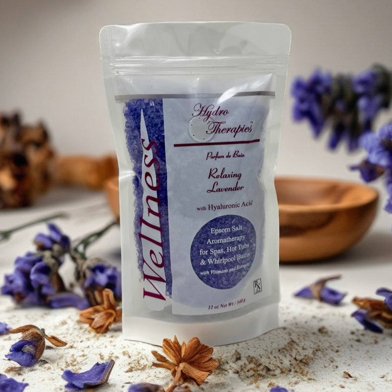 Wellness 12oz Epsom salt aromatherapy pouch with relaxing lavender scent in resealable white and clear bag with purple accents