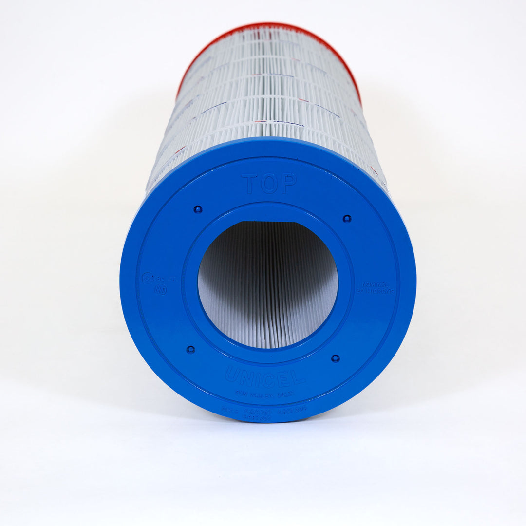 Cylindrical pool filter cartridge with red and blue plastic end caps and pleated white filter material