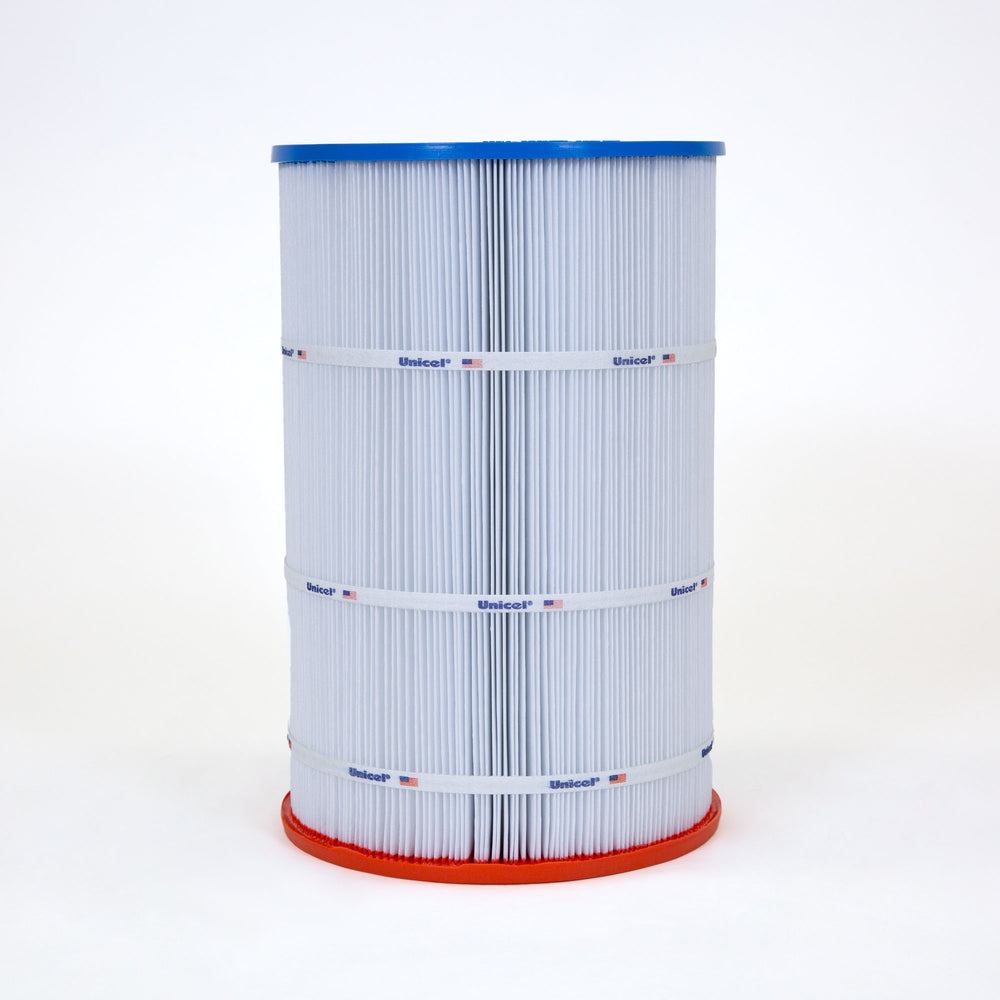 Cylindrical pool filter cartridge with white pleated material, blue top, and red bottom against a white background