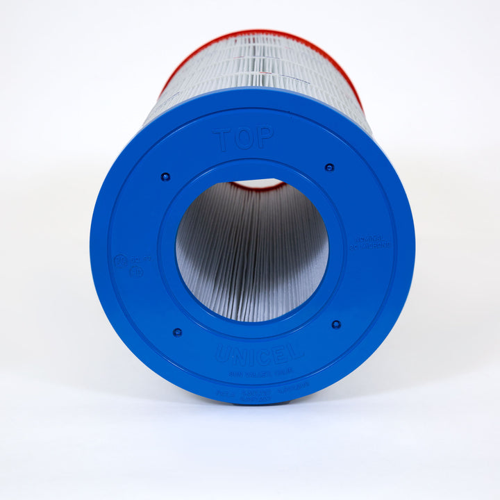 cylindrical pool filter cartridge with pleated white material and blue top plastic end cap marked Unicel