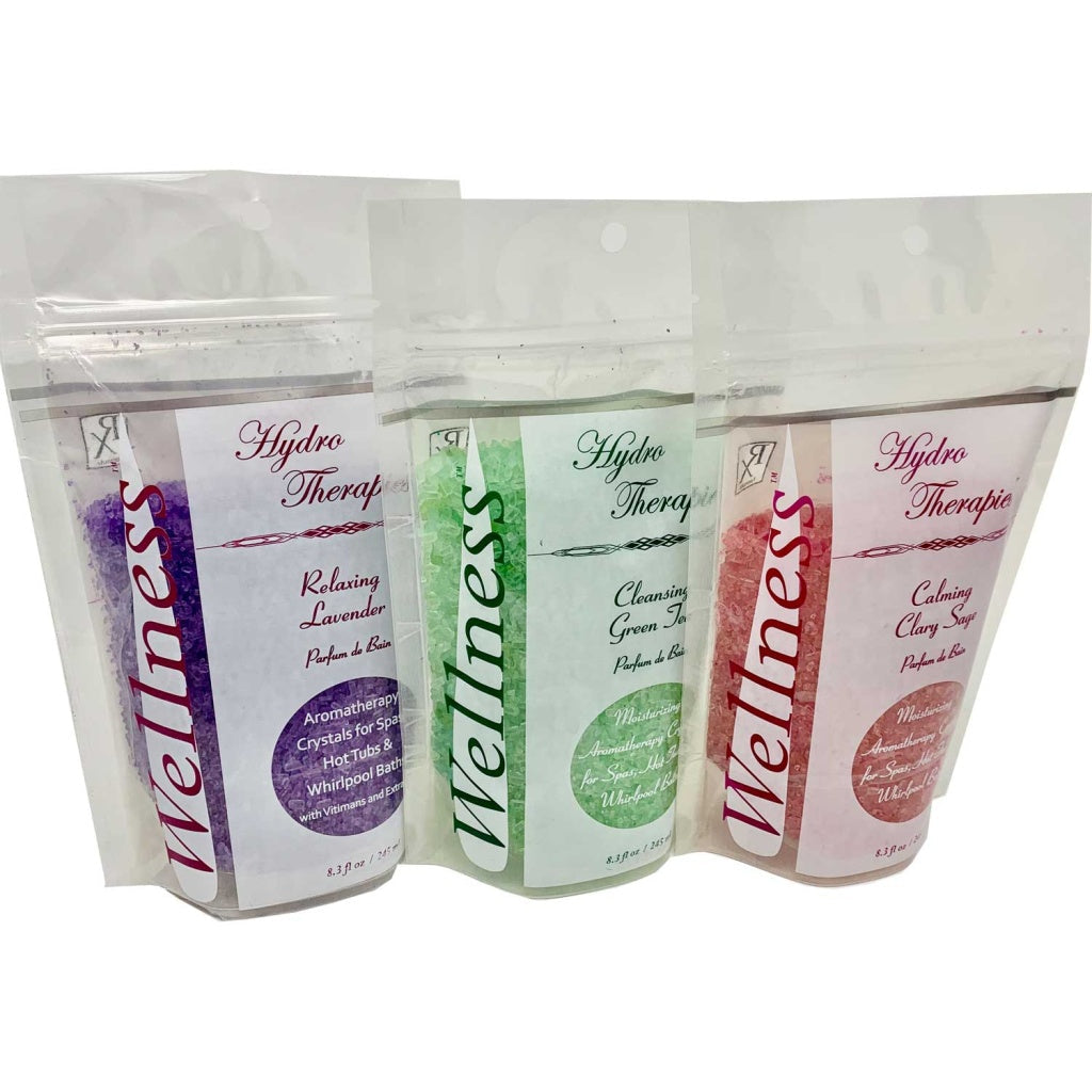 Three Wellness Hydro Therapies aromatherapy crystal bags in clear resealable pouches, purple lavender, green tea, and pink clary sage scents