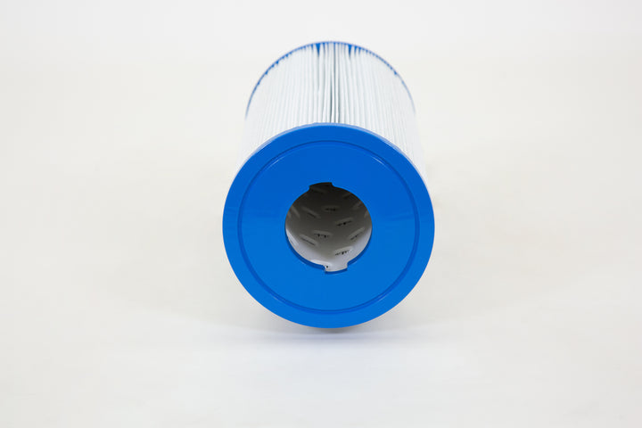 Cylindrical replacement spa filter cartridge with pleated white filter material and bright blue plastic end caps on white background