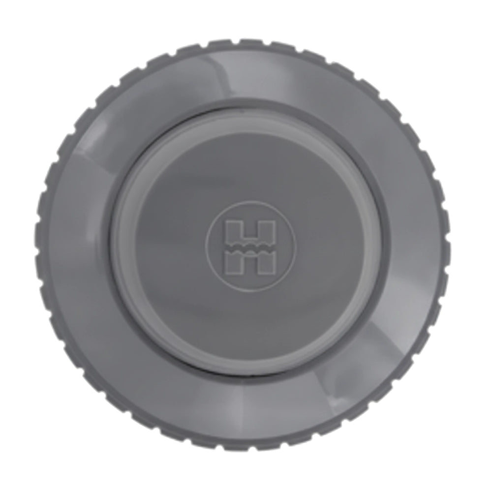 Dark gray round Hayward Hydrosweep eyeball inlet fitting with ridged outer edge and embossed logo at center.