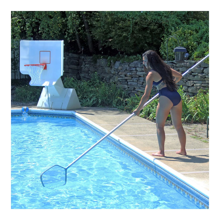 Woman using the JED Deluxe Frame Pool Leaf Skimmer&