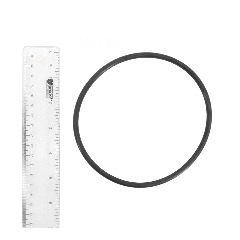 Black rubber JED 15-472 chlorinator O-ring shown beside a ruler measuring about 4.5 inches across.