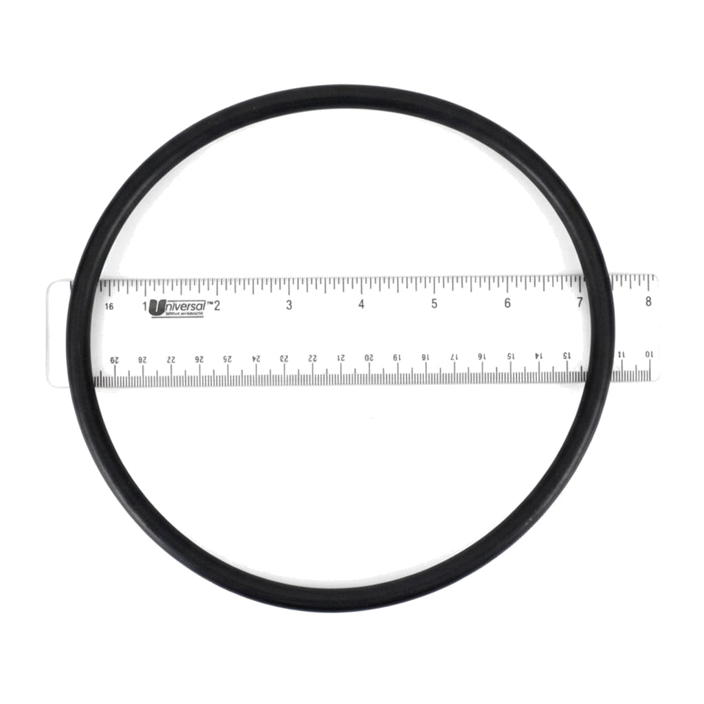 Black rubber clamp O-ring, Pentair 52000500, laid over a ruler showing about 7 inches diameter.
