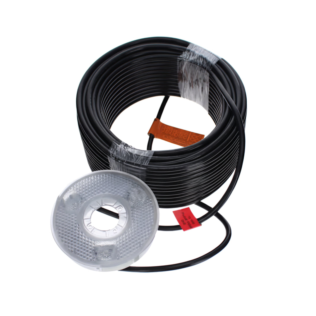Coiled black electrical cord with attached clear circular LED bubbler component for aquatic lighting