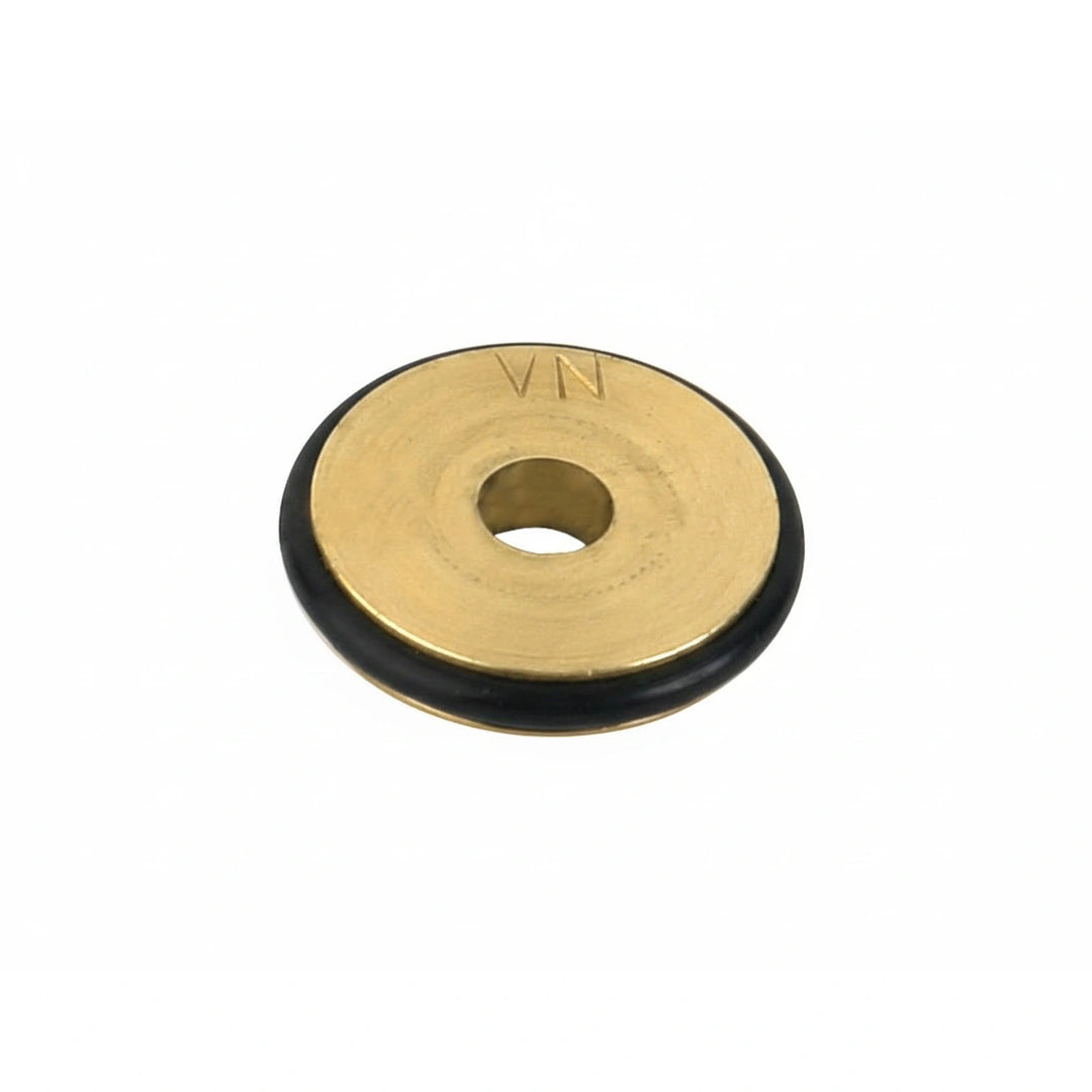 small round brass component with central hole and black rubber gasket around its edge marked VN