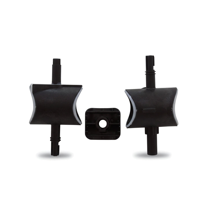 three black plastic valve parts including two curved blade-like pieces and one small square piece with circular hole