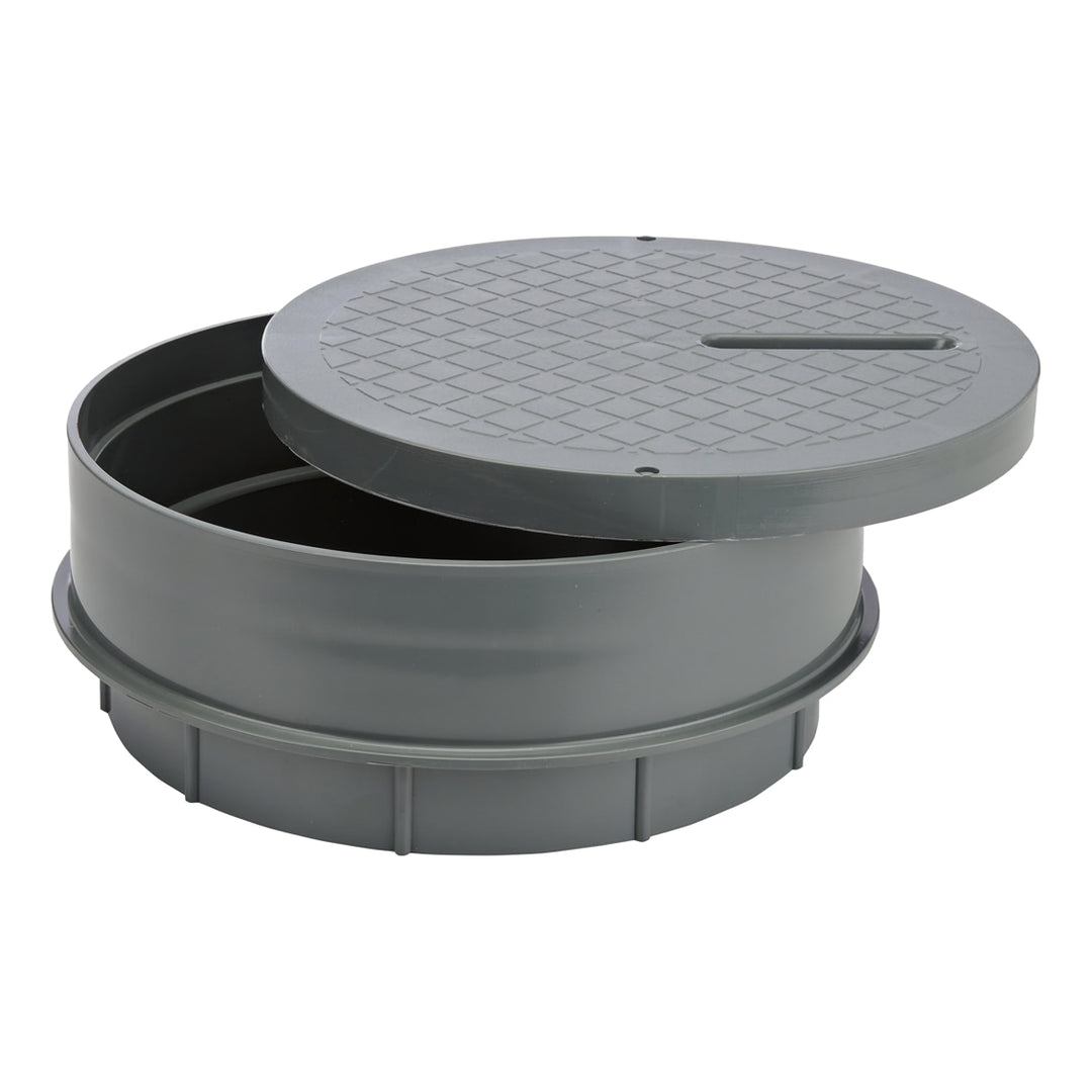 round gray plastic cover with textured top and beveled edge partially open revealing empty interior cylindrical base