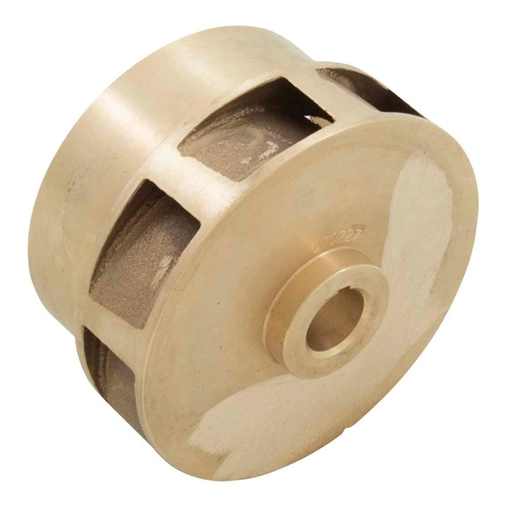 Brass Pentair impeller 070227 with curved vanes and center bore, part number stamped on the hub.