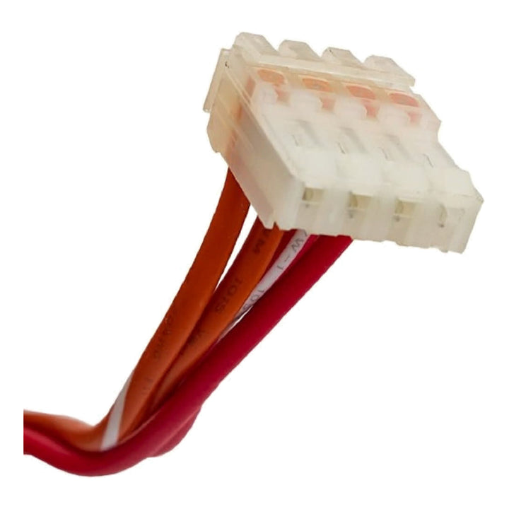 Close-up of white plastic electrical connector with five slots attached to red and orange wires