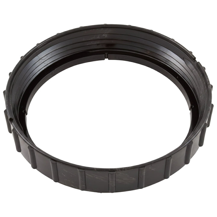 black circular plastic lock ring with evenly spaced ridges on outer surface and smooth inner side