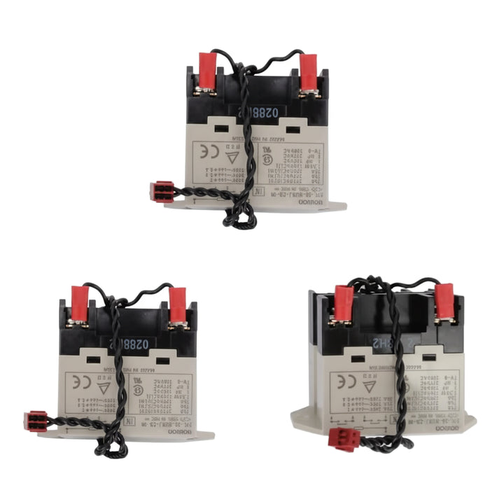 three black and gray electrical components with red connectors and attached black wires displayed on a white background