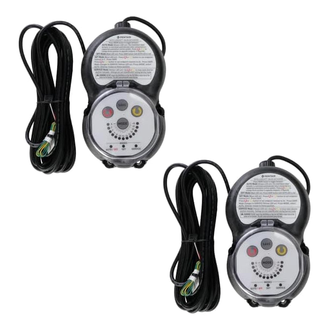 Two identical black circular electronic devices with attached long black cables and multiple buttons and labels on the front