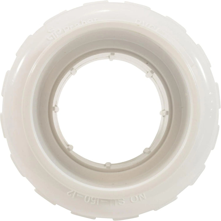 white plastic union plumbing fitting with ridged outer edge and smooth inner circular opening