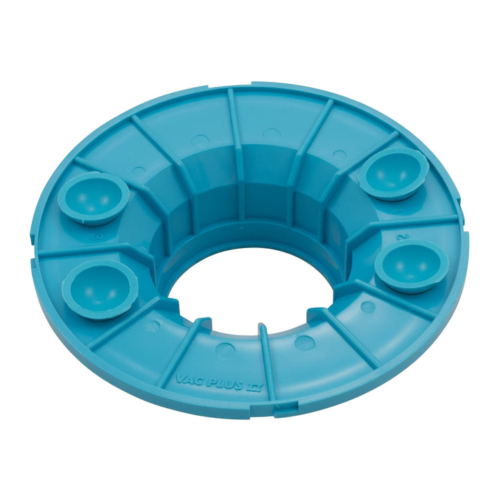 blue circular plastic plate with raised structural segments and four cup-like protrusions arranged symmetrically around the center