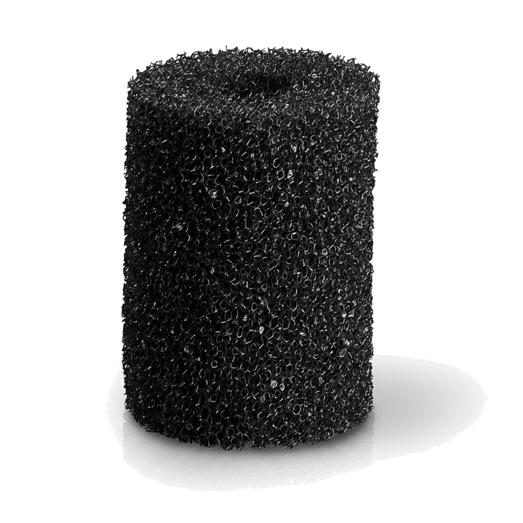 cylindrical black foam scrubber with open cell structure casting shadow on white surface