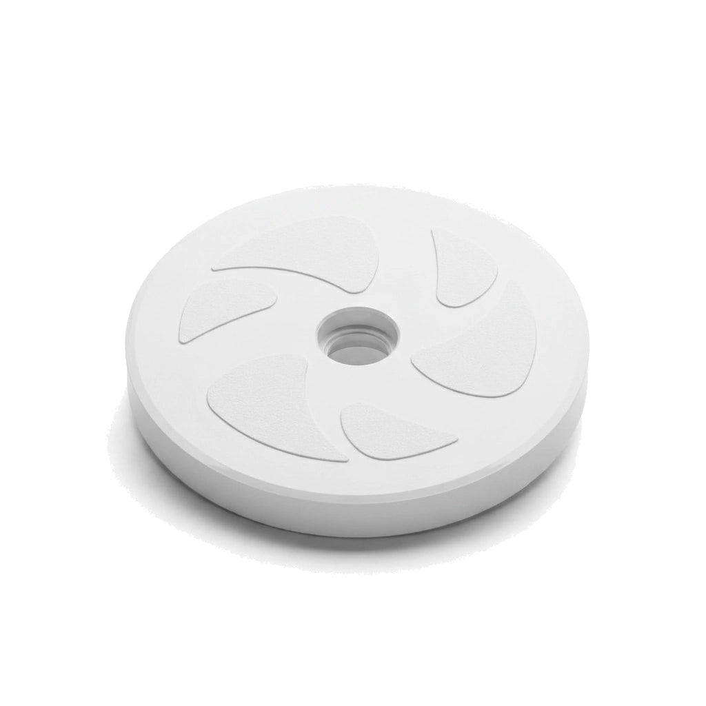 white circular wheel with central hole and four curved raised shapes evenly spaced on surface