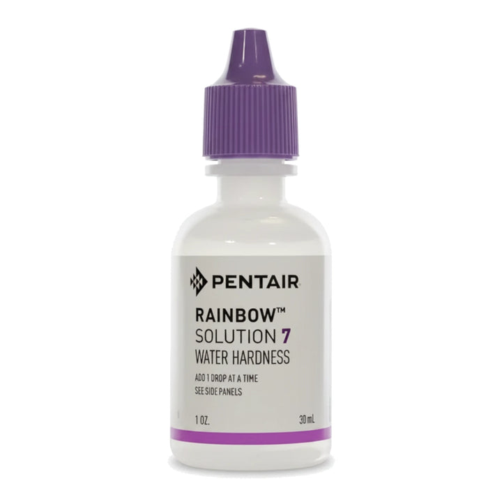 Small white plastic dropper bottle with purple cap labeled Pentair Rainbow Solution 7 water hardness one ounce