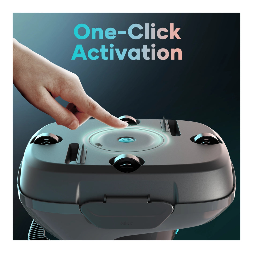 A finger presses the glowing center button on top of the gray Aiper Scuba SE cordless robotic pool cleaner.