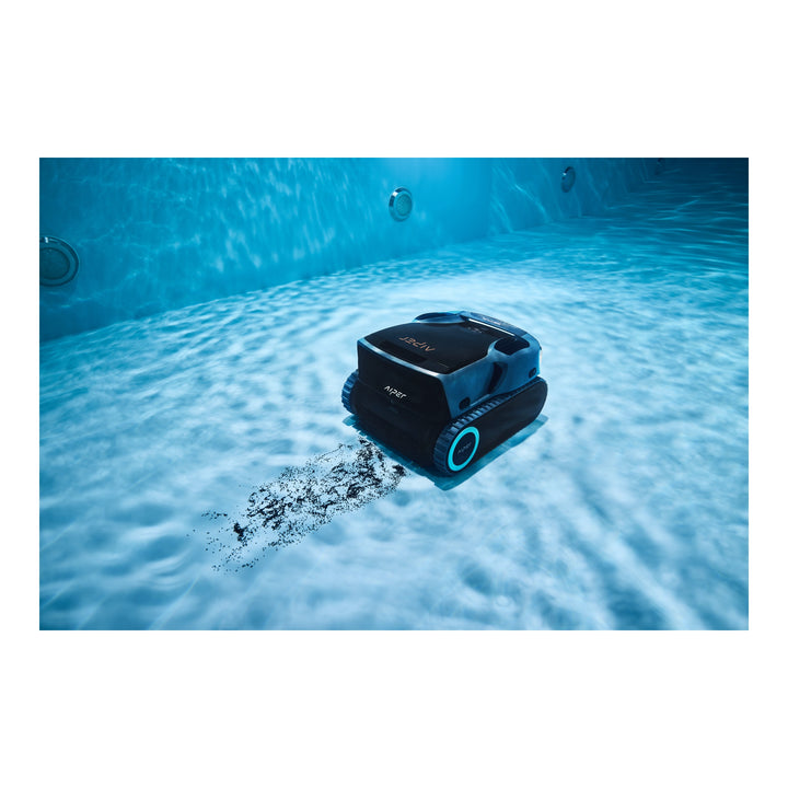 Aiper Scuba X1 Pro Max cordless robotic pool cleaner on a pool floor, stirring up debris behind it.