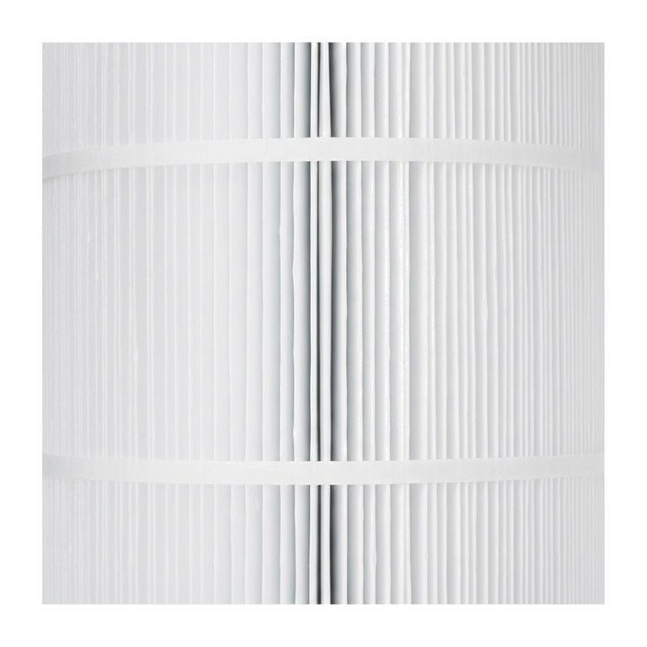 close-up of cylindrical white pleated filter cartridge showing fine vertical ridges and horizontal bands